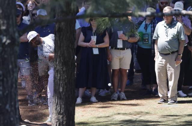 South Africa s Erik van Rooyen hits from behind a tree on the seventh hole during the third round of the Masters Tournament at Augusta National Golf Club in Augusta, Georgia on Saturday, April 13, 2024.  AUG20240413503 TANNENxMAURY