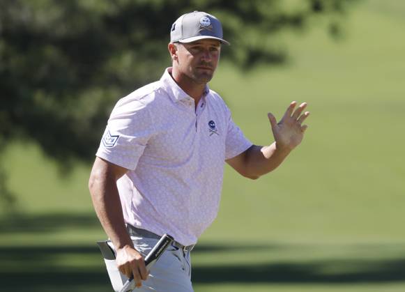 Bryson DeChambeau reacts after putting on the seventh hole during the third round of the Masters Tournament at Augusta National Golf Club in Augusta, Georgia on Saturday, April 13, 2024.  AUG20240413538 TANNENxMAURY