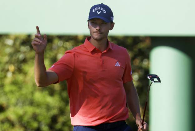 Denmark s Nicolai Hojgaard reacts after a birdie putt on the tenth green during the third round of the Masters Tournament at Augusta National Golf Club in Augusta, Georgia on Saturday, April 13, 2024.  AUG20240413545 TANNENxMAURY