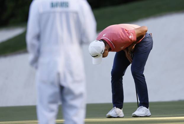 Collin Morikawa reacts after missing a birdie putt on the thirteenth hole during the third round of the Masters Tournament at Augusta National Golf Club in Augusta, Georgia on Saturday, April 13, 2024.  AUG20240413117 JOHNxANGELILLO