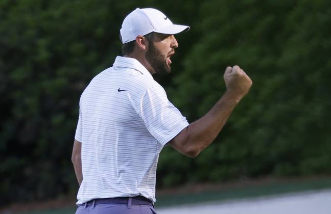 Scottie Scheffler reacts after sinking an eagle putt on the thirteenth hole during the third round of the Masters Tournament at Augusta National Golf Club in Augusta, Georgia on Saturday, April 13, 2024.  AUG20240413134 JOHNxANGELILLO