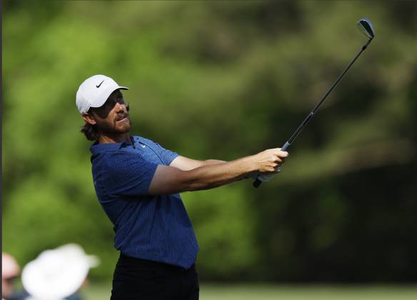 England s Tommy Fleetwood hits his tee shot on the twelfth hole during the third round of the Masters Tournament at Augusta National Golf Club in Augusta, Georgia on Saturday, April 13, 2024.  AUG20240413146 JOHNxANGELILLO