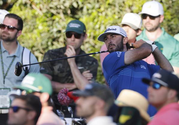 Max Homa tees off on the fifteenth hole during the third round of the Masters Tournament at Augusta National Golf Club in Augusta, Georgia on Saturday, April 13, 2024.  AUG20240413551 TANNENxMAURY
