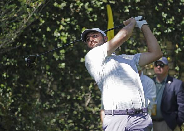 Golf: Masters Tournament Scottie Scheffler of the United States hits off the second tee during the third round of the Masters Tournament at Augusta National Golf Club in Augusta, Georgia, on April 13, 2024.  A14AA0002706538P