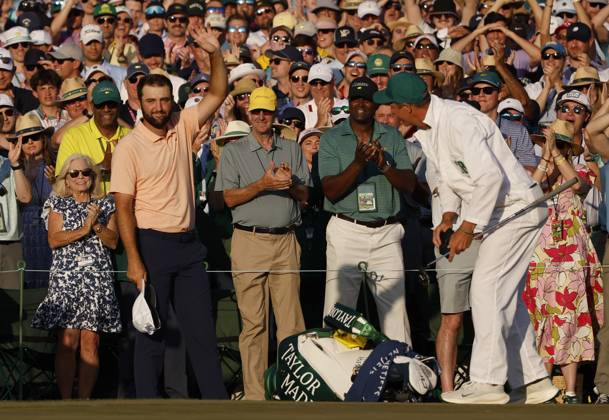 Scottie Scheffler celebrates after winning the Masters tournament at Augusta National Golf Club in Augusta, Georgia on Sunday, April 14, 2024. Scheffler won with a score of 11 under par.  AUG20240414175 JOHNxANGELILLO