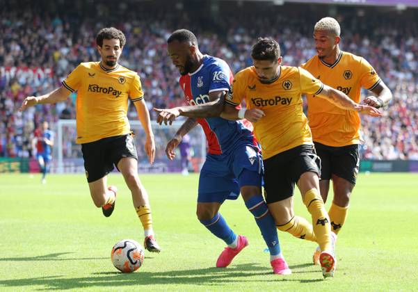 Crystal Palace v Wolverhampton Wanderers - Premier League - Selhurst Park September 3, 2023, London: London, England, 3rd September 2023. Jordan Ayew of Crystal Palace is challenged by Pedro Neto of Wolverhampton Wanderers during the Premier League match at Selhurst Park, London. (Credit Image: Ã‚Â Paul Terry Sportimage Cal Media) London EDITORIAL USE ONLY Copyright: xx ZUMA-20230903_faf_si1_074.jpg PaulxTerryx csmphotothree148794