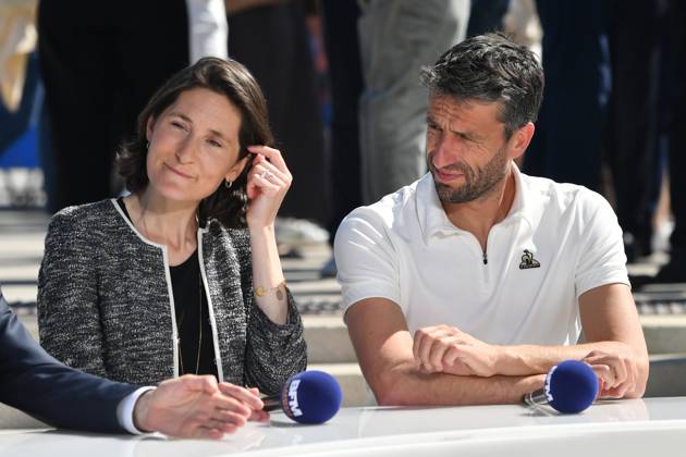 (240509) -- MARSEILLE, May 9, 2024 -- French Sports Minister Amelie Oudea-Castera (L) and President of the Paris 2024 Olympics and Paralympics Organising Committee Tony Estanguet are seen in a TV interview during the relay of the Olympic flame of Paris 2024 in Marseille, France, May 9, 2024. (Photo by Xinhua) (SP)FRANCE-MARSEILLE-2024 PARIS OLYMPIC-TOURCH RELAY JulienxMattia 
