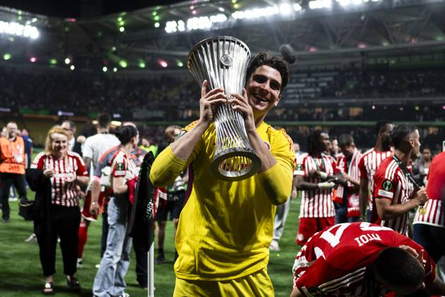 Olympiacos FC v ACF Fiorentina - UEFA Conference League Konstantinos Tzolakis of Olympiacos FC celebrates with the trophy during the award ceremony following the UEFA Conference League final football match between Olympiacos FC and ACF Fiorentina. Athens Greece Copyright: xNicolòxCampox