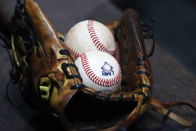 May 31, 2024, Mexico City, Ciudad de Mexico, Mexico: A baseball glove and baseballs are seen during the Mexican Baseball League (LMB) match 1 between Dorados de Chihuahua and Diablos Rojos del Mo xico , at Alfredo Harp Helu Stadium.Ã‚ Diablos Rojos defeat Dorados de Chihuahua 3-1. Mexico City Mexico - ZUMAe321 20240531_zsa_e321_004 Copyright: xCarlosxSantiago xEyepixxGroupx
