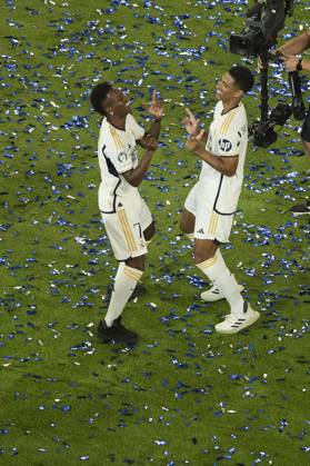 Vinicius Jr (Real Madrid CF) and Jude Bellingham (Real Madrid CF) dancing during the Trophy parade, Real Madrid trophy parade, Real Madrid Trophy parade, Cibeles, June 3, 2024, Madrid, Spain.