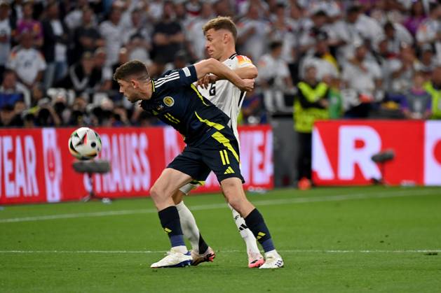 14 06 2024, xjrdrx, Football EM 2024, Germany Scotland emspor, v l Ryan Christie Team Scotland Joshua Kimmich German National Football Team DFB Zweikampf, action, action, battle for the ball DFL DFB REGULATIONS PROHIBIT ANY USE OF PHOTOGRAPHS as IMAGE SEQUENCES and or QUASI VIDEO Munich