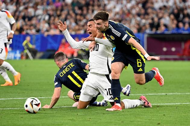 14 06 2024, xjrdrx, Football EM 2024, Germany Scotland emspor, v l Ryan Christie Team Scotland Jamal Musiala Deutsche Fussball Nationalmannschaft DFB Kieran Tierney Team Scotland Zweikampf, Aktion, action, battle for the ball DFL DFB REGULATIONS PROHIBIT ANY USE OF PHOTOGRAPHS as IMAGE SEQUENCES and or QUASI VIDEO Munich