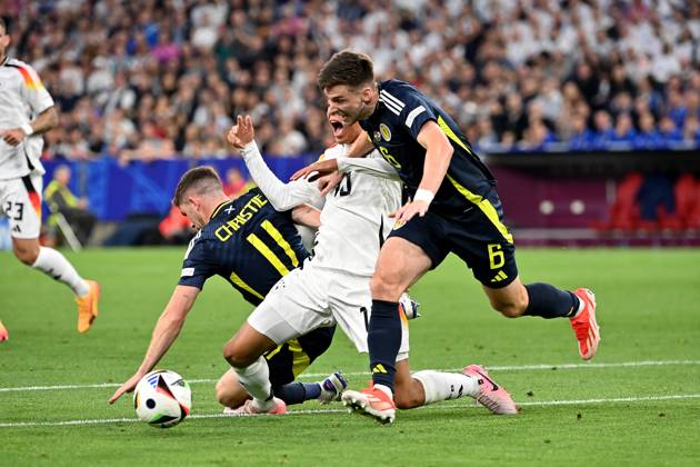 14 06 2024, xjrdrx, Football EM 2024, Germany Scotland emspor, v l Ryan Christie Team Scotland Jamal Musiala Deutsche Fussball Nationalmannschaft DFB Kieran Tierney Team Scotland Zweikampf, Aktion, action, battle for the ball DFL DFB REGULATIONS PROHIBIT ANY USE OF PHOTOGRAPHS as IMAGE SEQUENCES and or QUASI VIDEO Munich