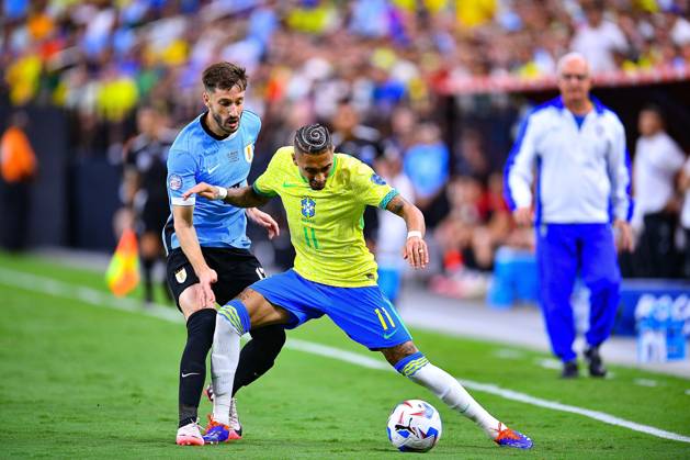 RECORD DATE NOT STATED Copa America USA 2024 Uruguay (4p) 0-0 (2p) Brazil - Quarter-final Matias Vina (L) of Uruguay fights for the ball with Raphinha (R) of Brazil during the CONMEBOL Copa America 2024 Quarter-final match between Uruguay and Brazil, at Allegiant Stadium, on July 06, 2024 in Las Vegas, Nevada, United States. LAS VEGAS NEVADA UNITED STATES Copyright: xAdrianxMaciasx 20240706201257_CA_QF_2024_URU_BRA_RAPHINHA79
