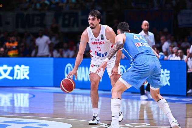 Croatia v Greece - FIBA Olympic Qualifying Tournament 2024 Final Dario Saric of Croatia is competing with Dinos Mitoglou of Greece during the FIBA Olympic Qualifying Tournament 2024 Final match between Croatia and Greece at Peace & Friendship Stadium on July 7, 2024, in Piraeus, Greece. Piraeus Greece  Copyright: xStefanosxKyriazisx originalFilename:kyriazis-croatiav240707_np7lI