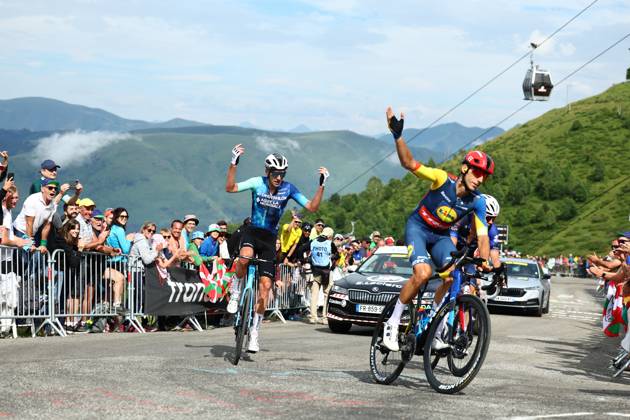 French Bruno Armirail of Decathlon Ag2r La Mondiale Team (L) pictured in action during stage 14 of the 2024 Tour de France cycling race, from Pau to Saint-Lary-Soulan Pla d Adet, France (151,9 km), on Saturday 13 July 2024. The 111th edition of the Tour de France starts on Saturday 29 June and will finish in Nice, France on 21 July. DAVIDxPINTENS x96367873x