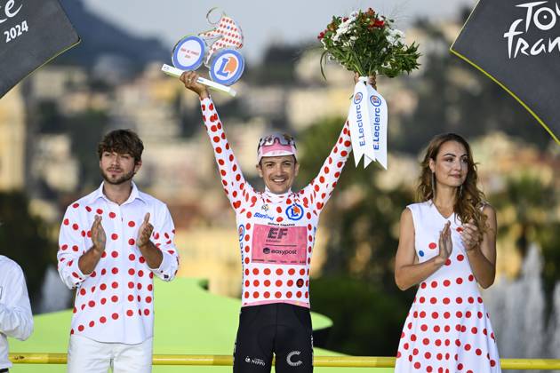 Ecuadorian Richard Carapaz of EF Education-EasyPost celebrates on the podium in the red polka-dot jersey for best climber after stage 21, the final stage of the 2024 Tour de France cycling race, an individual time trial from Monaco to Nice, France (33,7 km) on Sunday 21 July 2024. The 111th edition of the Tour de France starts on Saturday 29 June and will finish in Nice, France on 21 July. TOM GOYVAERTS TomxGoyvaerts x96846918x