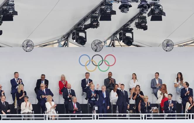 (240726) -- PARIS, July 26, 2024 -- International Olympic Committee (IOC) President Thomas Bach and French President Emmanuel Macron attend the opening ceremony of the Paris 2024 Olympic Games, Olympische Spiele, Olympia, OS in Paris, France, July 26, 2024. ) (PARIS2024) FRANCE-PARIS-OLY-OPENING CEREMONY ShenxBohan