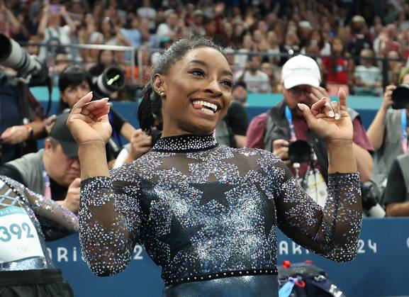 (240728) -- PARIS, July 28, 2024 -- Simone Biles of the United States celebrates after the artistic gymnastics women s qualification match during the Paris 2024 Olympic Games, Olympische Spiele, Olympia, OS at Bercy Arena in Paris, France, July 28, 2024. Cao Can) (PARIS2024)FRANCE-PARIS-OLY-ARTISTIC GYMNASTICS CaoCan