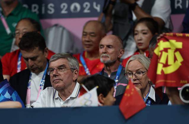 (240730) -- PARIS, July 30, 2024 -- International Olympic Committee (IOC) President Thomas Bach (L, front) is seen during the mixed doubles gold medal Table tennis, Tischtennis match between Wang Chuqin Sun Yingsha of China and Ri Jong Sik Kim Kum Yong of the Democratic People s Republic of Korea at the Paris 2024 Olympic Games, Olympische Spiele, Olympia, OS in Paris, France, on July 30, 2024. Wang Dongzhen) (PARIS2024)FRANCE-PARIS-OLY-TABLE TENNIS WangDongZhen