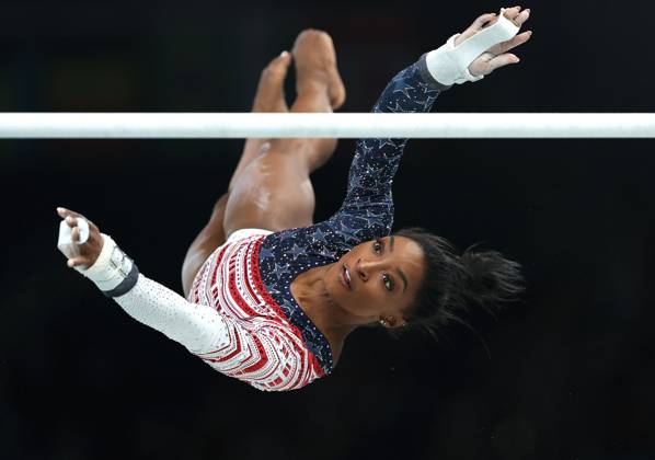 (240730) -- PARIS, July 30, 2024 -- Simone Biles of the United States competes during the uneven bars event of the artistic gymnastics women s team final at the Paris 2024 Olympic Games, Olympische Spiele, Olympia, OS in Paris, France, July 30, 2024. ) (PARIS2024) FRANCE-PARIS-OLY-ARTISTIC GYMNASTICS CaoxCan