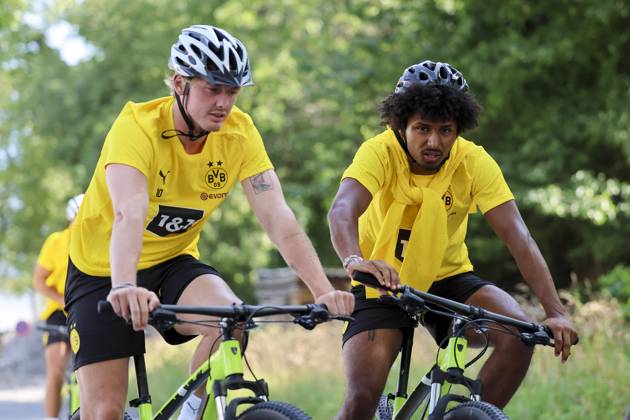 Julian Brandt Borussia Dortmund and Karim Adeyemi Borussia Dortmund ride their bikes to the training ground, Day 1, Borussia Dortmund training camp, , 01 08 2024, Bad Ragaz, Switzerland