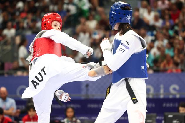 OLYMPICS - Olympic Summer Games 2024 PARIS,FRANCE,10.AUG.24 - OLYMPICS, TAEKWONDO - Olympic Summer Games Paris 2024, +67kg, women. Image shows Marlene Jahl (AUT) and Zeqi Zhou (CHN). GEPAxpictures xArminxRauthner