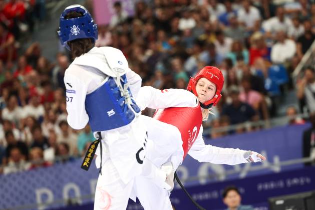 OLYMPICS - Olympic Summer Games 2024 PARIS,FRANCE,10.AUG.24 - OLYMPICS, TAEKWONDO - Olympic Summer Games Paris 2024, +67kg, women. Image shows Zeqi Zhou (CHN) and Marlene Jahl (AUT). GEPAxpictures xArminxRauthner