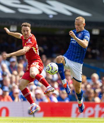Football - FA Premier League - Ipswich Town FC v Liverpool FC IPSWICH, ENGLAND - Saturday, August 17, 2024: Liverpool s Diogo Jota (L) is challenged by Ipswich Town s Luke Woolfenden during the FA Premier League match between Ipswich Town FC and Liverpool FC at Portman Road. (Photo by David Rawcliffe Propaganda) IPSWICH Portman Road SUFFOLK ENGLAND  Copyright: xDavidxRawcliffex P2024-08-17-Ipswich_Liverpool-54