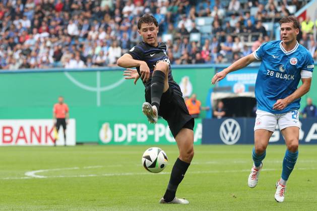18 08 2024, xtgx, Football DFB Cup 1 round, FC Hansa Rostock Hertha BSC Berlin emspor, v l Linus Gechter Hertha, 44 , Alexander Rossipal Rostock, 21 duel, duel, fight, tackle DFL DFB REGULATIONS PROHIBIT ANY USE OF PHOTOGRAPHS as IMAGE SEQUENCES and or QUASI VIDEO Rostock