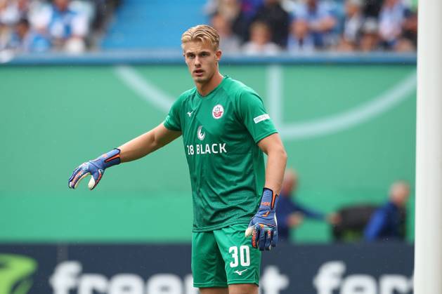 18 08 2024, xtgx, Fußball DFB Pokal 1 Runde, FC Hansa Rostock Hertha BSC Berlin emspor, v l Max Hagemoser Rostock, 30 DFL DFB REGULATIONS PROHIBIT ANY USE OF PHOTOGRAPHS as IMAGE SEQUENCES and or QUASI VIDEO Rostock