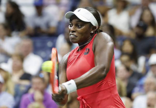 Sloane Stephens returns a ball to Clara.Burel of France in Arthur Ashe Stadium in the first round of the 2024 US Open Tennis Championships in at the USTA Billie Jean King National Tennis Center on Monday, August 26, 2024 in New York City.  NYP20240826125 JOHNxANGELILLO