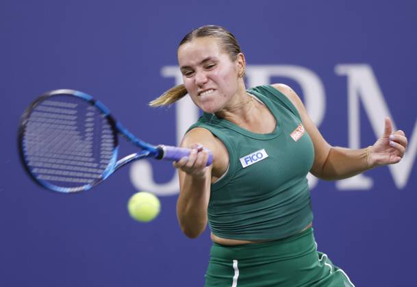 Sofia Kenin returns a ball to Emma Raducanu of the United Kingdom in her first round 3 sets victory at the 2024 US Open Tennis Championships in at the USTA Billie Jean King National Tennis Center on Tuesday, August 27, 2024 in New York City.  NYP20240827120 JOHNxANGELILLO
