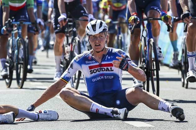 Belgian Tim Merlier of Soudal Quick-Step sits on the ground after crashing during the sprint of the first stage of the Renewi Tour multi-stage cycling race, from Riemst to Bilzen (163,6 km) on Wednesday 28 August 2024. The five-day race takes place in Belgium and the Netherlands. DAVIDxPINTENS x99251864x