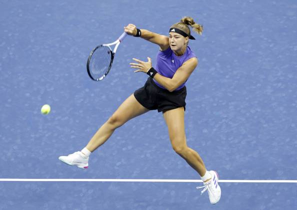 Karolina Muchova hits an overhead at net to Naomi Osaka in the second round in Arthur Ashe Stadium of the 2024 US Open Tennis Championships in at the USTA Billie Jean King National Tennis Center on Thursday, August 29, 2024 in New York City.  NYP20240829108 JOHNxANGELILLO
