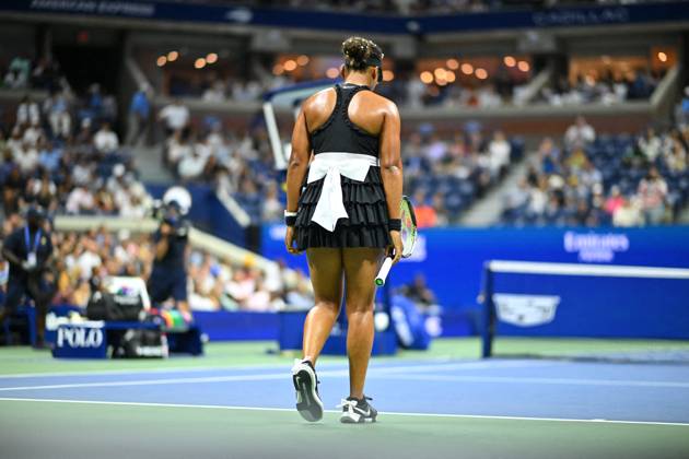 US Open - Osaka Attracts Attention Again With Her Dress Naomi Osaka (JPN) during her second round match at the 2024 US Open at Billie Jean National Tennis Center in New York City, NY, USA, on August 29, 2024. Just like in the first round, Naomi Osaka once again became the center of attention for the onlookers and the photographers for her particular dress at the entrance to the court for her US Open match. This time, Naomi wore a black dress adorned with another giant bow. This one, in white, captured all the attention in the pre-match buildup. Photo by Corinne Dubreuil ABACAPRESS.COM New York City NY United States  Copyright: xDubreuilxCorinne ABACAx