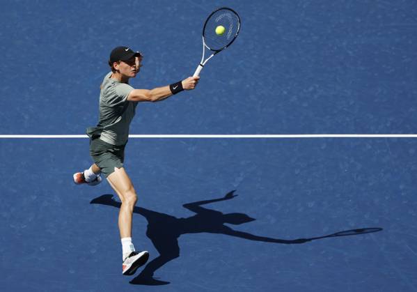 Jannik Sinner of Italy hits a volley at net in the first set before defeating Christopher O Connell of Australia in the third round in Arthur Ashe Stadium of the 2024 US Open Tennis Championships in at the USTA Billie Jean King National Tennis Center on Saturday, August 31, 2024 in New York City.  NYP20240831109 JOHNxANGELILLO
