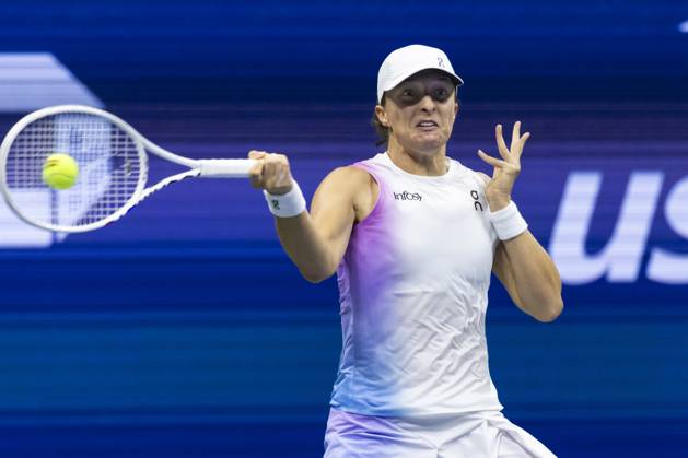 Iga Swiatek of Poland returns a ball in the first set against Anastasia Pavlyuchenkova of Russia in the third round in Arthur Ashe Stadium of the 2024 US Open Tennis Championships at the USTA Billie Jean King National Tennis Center on Saturday, August 31, 2024 in New York City.  NYP20240831512 COREYxSIPKIN