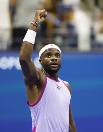 Frances Tiafoe celebrates after match point defeating Alexei Popyrin of Australia in 4 sets in the 4th round in Arthur Ashe Stadium of the 2024 US Open Tennis Championships in at the USTA Billie Jean King National Tennis Center on Sunday, September 1, 2024 in New York City.  NYP20240901132 JOHNxANGELILLO