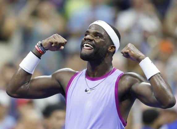 Frances Tiafoe celebrates after match point defeating Alexei Popyrin of Australia in 4 sets in the 4th round in Arthur Ashe Stadium of the 2024 US Open Tennis Championships in at the USTA Billie Jean King National Tennis Center on Sunday, September 1, 2024 in New York City.  NYP20240901131 JOHNxANGELILLO