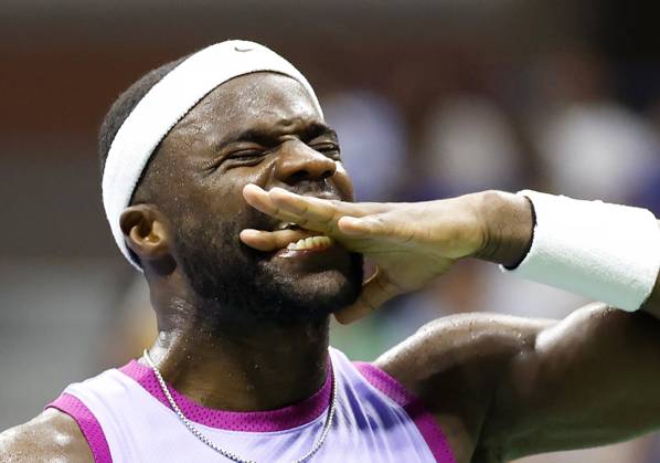 Frances Tiafoe reacts after a point before defeating Alexei Popyrin of Australia in 4 sets in the 4th round in Arthur Ashe Stadium of the 2024 US Open Tennis Championships in at the USTA Billie Jean King National Tennis Center on Sunday, September 1, 2024 in New York City.  NYP20240901133 JOHNxANGELILLO