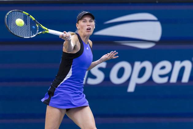 Caroline Wozniacki of Denmark returns a ball to Beatriz Haddad Maia of Brazil in the fourth round in Arthur Ashe Stadium of the 2024 US Open Tennis Championships at the USTA Billie Jean King National Tennis Center on Monday, September 2, 2024 in New York City.  NYP20240902501 COREYxSIPKIN