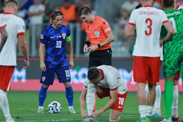 Croatia v Poland - UEFA Nations League 2024 25 League A Group A1 OSIJEK, CROATIA - SEPTEMBER 8: Player of Croatia Luka Modric listens to the referee before shooting a goal during the UEFA Nations League 2024 25 League A Group A1 match between Croatia and Poland at on September 8, 2024 in Osijek, Croatia. DavorxJavorovic Pixsell