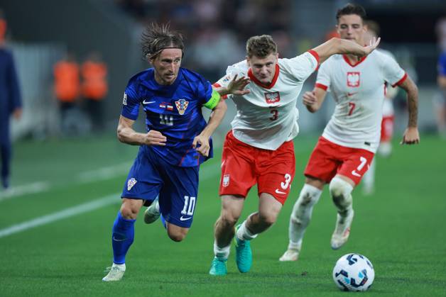 Croatia v Poland - UEFA Nations League 2024 25 League A Group A1 OSIJEK, CROATIA - SEPTEMBER 8: Player of Croatia Luka Modric and player of Poland Pawel Dawidowicz fight for a ball during the UEFA Nations League 2024 25 League A Group A1 match between Croatia and Poland at on September 8, 2024 in Osijek, Croatia. DavorxJavorovic Pixsell