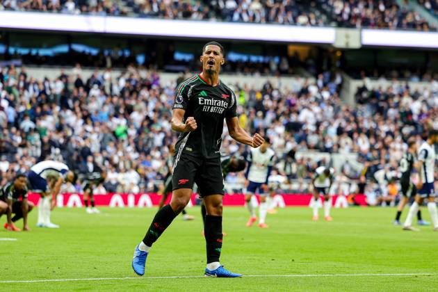 Tottenham Hotspur v Arsenal Premier League 15 09 2024. William Saliba (2) of Arsenal celebrates at full time during the Premier League match between Tottenham Hotspur and Arsenal at Tottenham Hotspur Stadium, London, United Kingdom on 15 September 2024. Editorial use only DataCo restrictions apply See www.football-dataco.com , Copyright: xNigelxKeenex PSI-20398-0035
