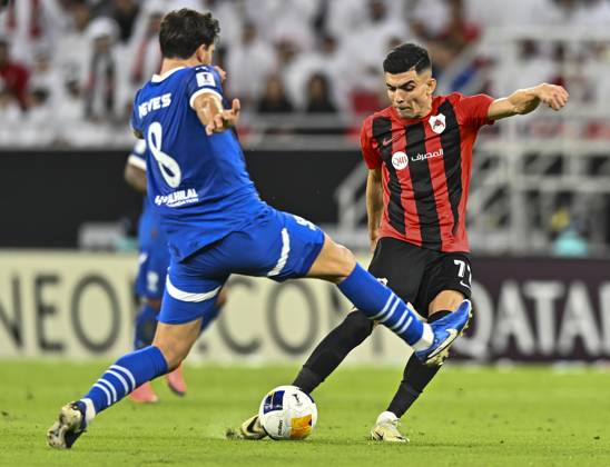 AFC CHAMPIONS LEAGUE ELITE, AL RAYYAN FC V AL-HILAL SFC Achraf Bencharki (R) of Al Rayyan SC and Ruben Neves of Al-Hilal SFC in action during the AFC Champions League elite west football match between Qatar s Al Rayyan SC and Saudi Arabia s Al-Hilal SFC at Ahmad Bin Ali Stadium in Al Rayyan, Qatar on September 17, 2024. DOHA Qatar Copyright: xNOUSHADx