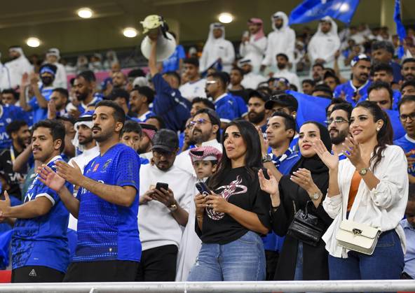 AFC CHAMPIONS LEAGUE ELITE, AL RAYYAN FC V AL-HILAL SFC Fans of Al-Hilal SFC cheer for the team during the AFC Champions League elite west football match between Qatar s Al Rayyan SC and Saudi Arabia s Al-Hilal SFC at Ahmad Bin Ali Stadium in Al Rayyan, Qatar on September 17, 2024. DOHA Qatar Copyright: xNOUSHADx