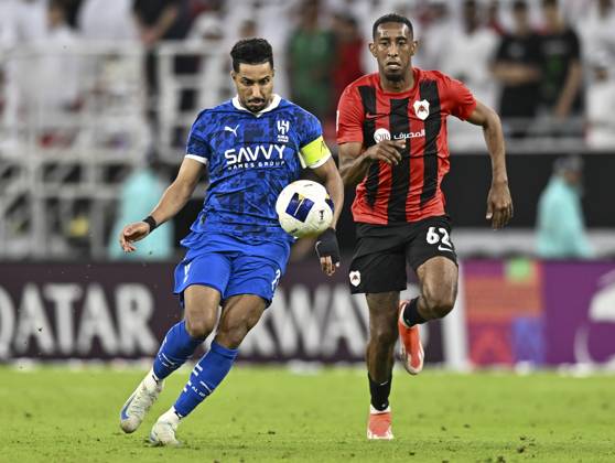 AFC CHAMPIONS LEAGUE ELITE, AL RAYYAN FC V AL-HILAL SFC Joshua Brenet (R) of Al Rayyan SC and Salem Al Dawsari of Al-Hilal SFC in action during the AFC Champions League elite west football match between Qatar s Al Rayyan SC and Saudi Arabia s Al-Hilal SFC at Ahmad Bin Ali Stadium in Al Rayyan, Qatar on September 17, 2024. DOHA Qatar Copyright: xNOUSHADx