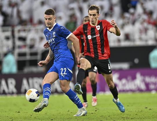 AFC CHAMPIONS LEAGUE ELITE, AL RAYYAN FC V AL-HILAL SFC Julien De Sart (R) of Al Rayyan SC and Sergej of Al-Hilal SFC in action during the AFC Champions League elite west football match between Qatar s Al Rayyan SC and Saudi Arabia s Al-Hilal SFC at Ahmad Bin Ali Stadium in Al Rayyan, Qatar on September 17, 2024. DOHA Qatar Copyright: xNOUSHADx