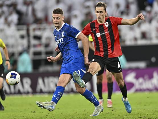 AFC CHAMPIONS LEAGUE ELITE, AL RAYYAN FC V AL-HILAL SFC Julien De Sart (R) of Al Rayyan SC and Sergej of Al-Hilal SFC in action during the AFC Champions League elite west football match between Qatar s Al Rayyan SC and Saudi Arabia s Al-Hilal SFC at Ahmad Bin Ali Stadium in Al Rayyan, Qatar on September 17, 2024. DOHA Qatar Copyright: xNOUSHADx